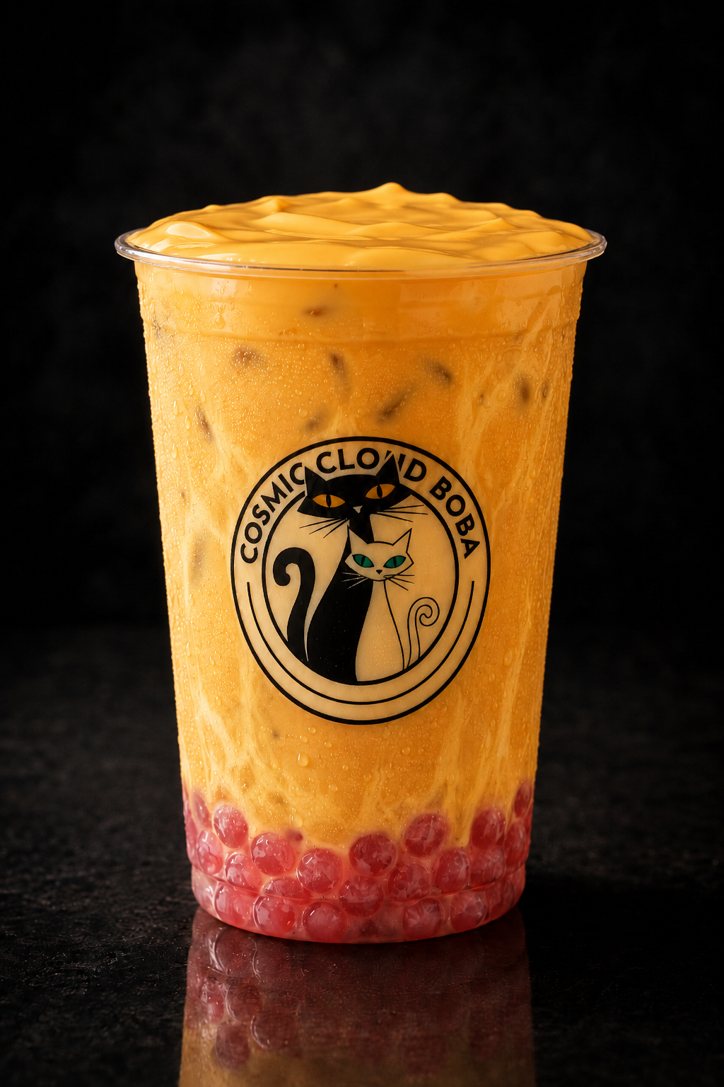 Mango milk tea with a mango milk cap